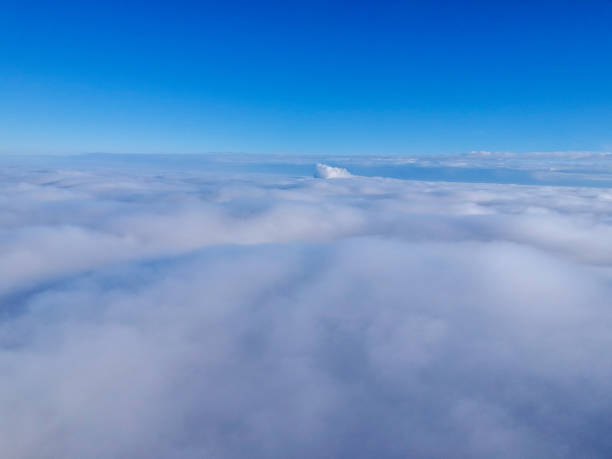 istock Above the cloudscapes and under the blue sky 1289709602