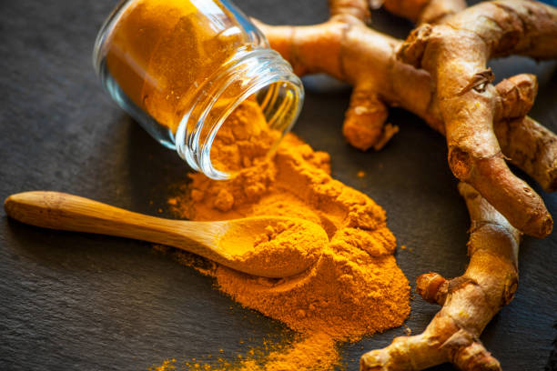 istock fresh Turmeric powder. Food photo concept 1289709708