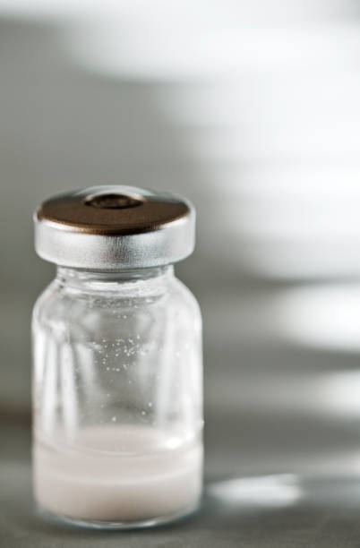istock vaccine in glass vial with aluminum cap, refrigerator bottom 1289711038