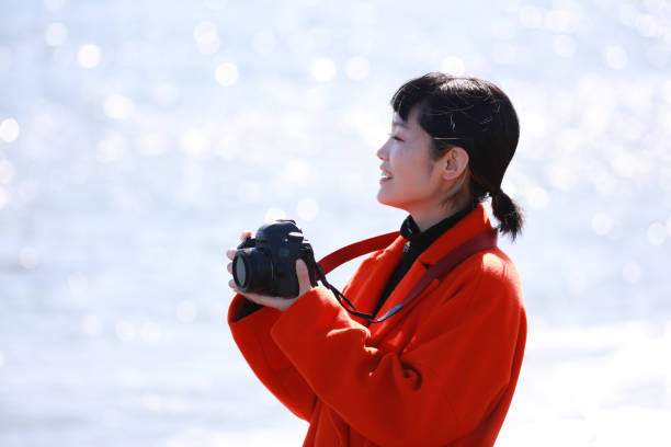 istock Woman taking a picture 1289711077