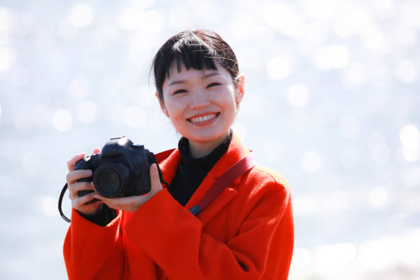 istock Woman taking a picture 1289712019