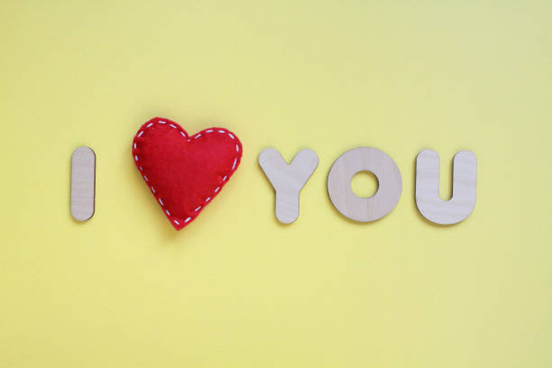 istock I love you concept on yellow. 1289716844