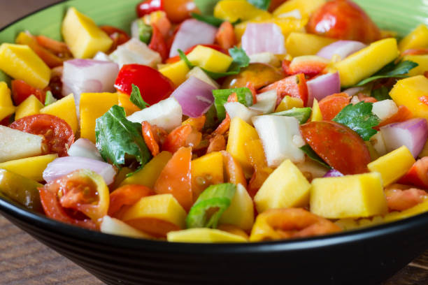 istock Mango, fennel, tomato, onion, celery salad 1289717732