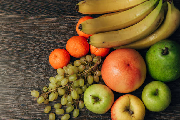 istock Fruits Composition Close Up With Water Droplets on the Peel with Copy Space 1289717899