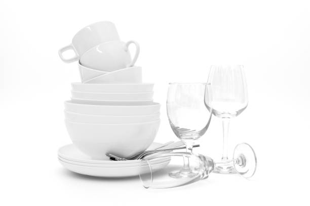 istock set clean dishes glasses on white background 1289719317