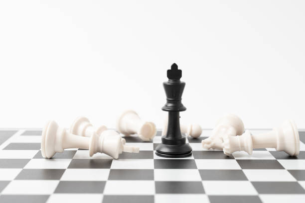 istock The winner chess on a chessboard background 1289719346