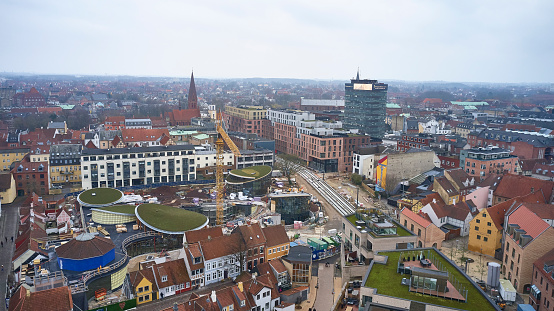 Drone shots Odense City. Central place in Odense old town. Odense is more than 800 years old and has a historical old part. A new amusement and theme park for the poet \
