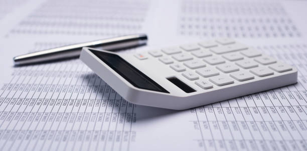istock Business financial documents with calculator. Accounting concept 1289724604