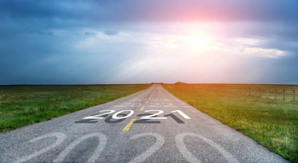 istock Number of 2020 to 2023 on empty asphalt road 1289726375