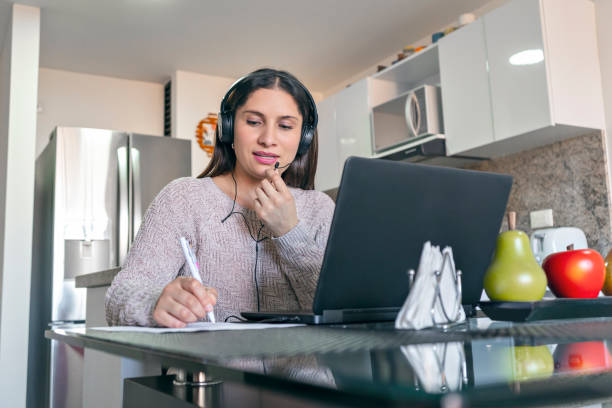 istock Woman working at home on her laptop. 1289726476