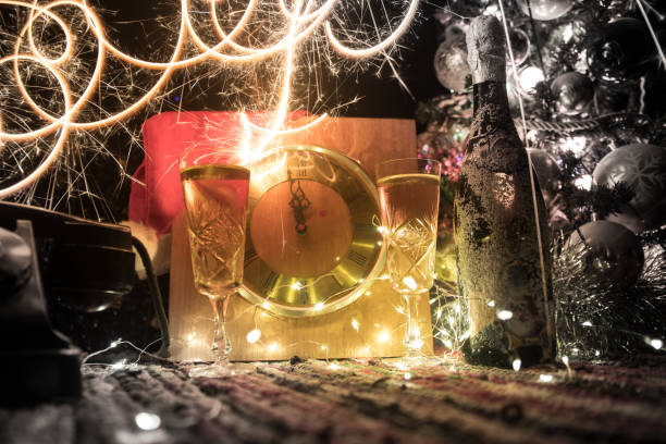 istock Traditional winter holiday alcohol drink in snow with creative New Year artwork. Copy space. Selective focus 1289732057