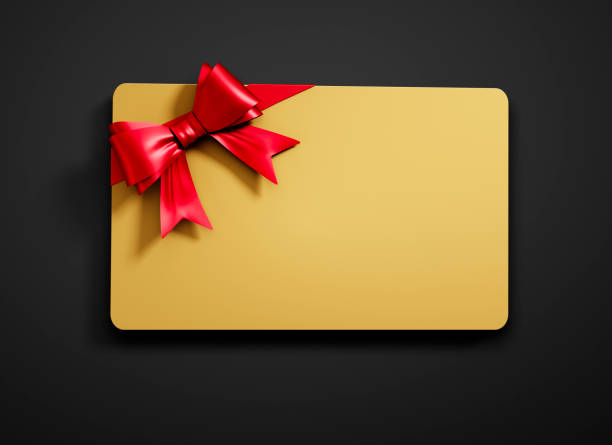 karta podarunkowa z wiązaną kokardką - gift card gift certificate gift gold zdjęcia i obrazy z banku zdjęć