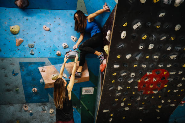 istock Women on the bouldering training together 1289735844