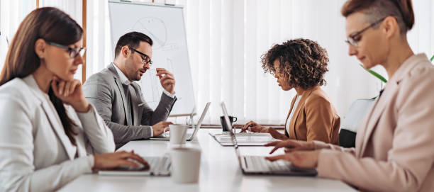 istock Business team discussing at the meeting 1289740974
