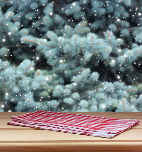 istock empty wooden table on a blurry winter background 1289741803