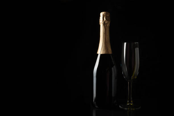 istock Champagne on a black background with space to copy. 1289744274
