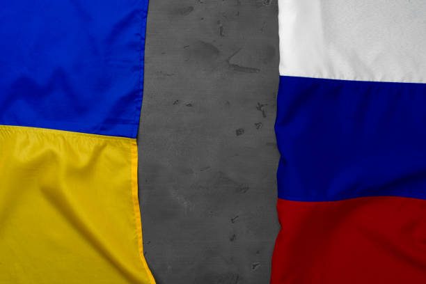 istock Flags of Russia and Ukraine together, copy space 1289745568