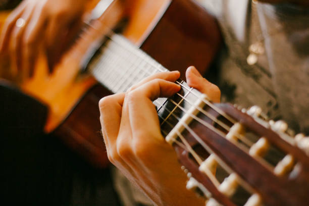 istock a man plays the guitar 1289746259