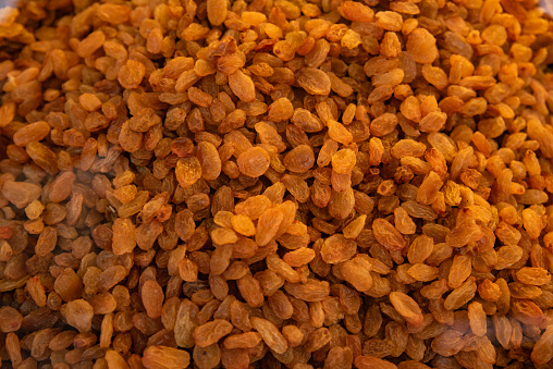 Closeup of golden sultana raisins