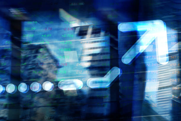 istock Finance. Arrow. New York Office Buildings and Trading Screen Data. 1289748415