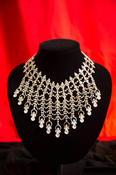 istock Classic jewelry on black form with vivid red background. 1289750731