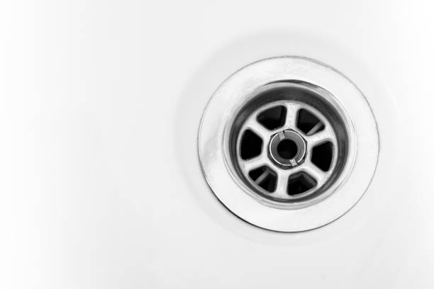istock drain in a white household sink or bathtub 1289750795