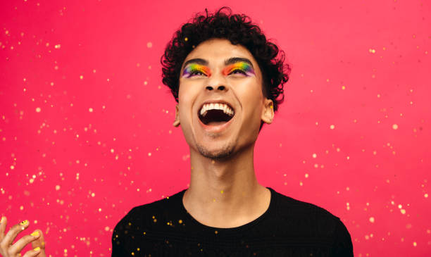 istock Excited gay man with glitters 1289751758