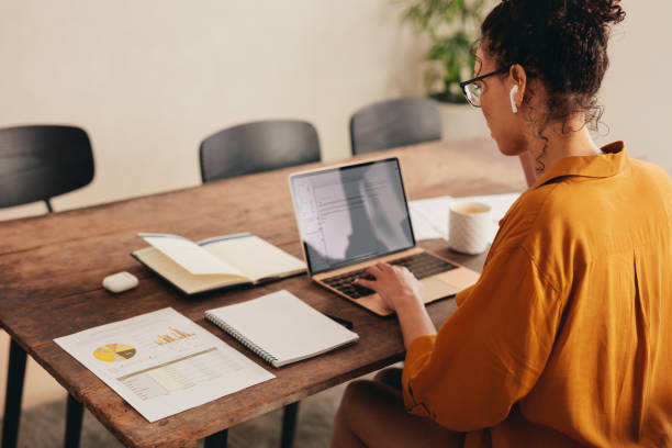 istock Businesswoman working remotely from home 1289751972