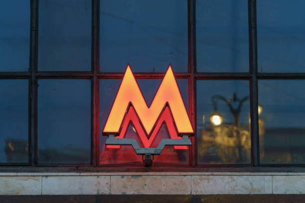 Moscow, Russia - December 2, 2020: Moscow cityscape in winter sunset during coronavirus pandemic. Moscow underground logo at the building