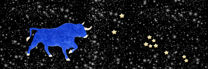 New year's wide-screen background with a figure of a bull cut out of plywood and a constellation Of Taurus made of toy stars, black background and snow. Art design, banner