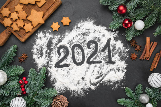 istock 2021 New Year Gingerbread Cookies Baking Background 1289755930