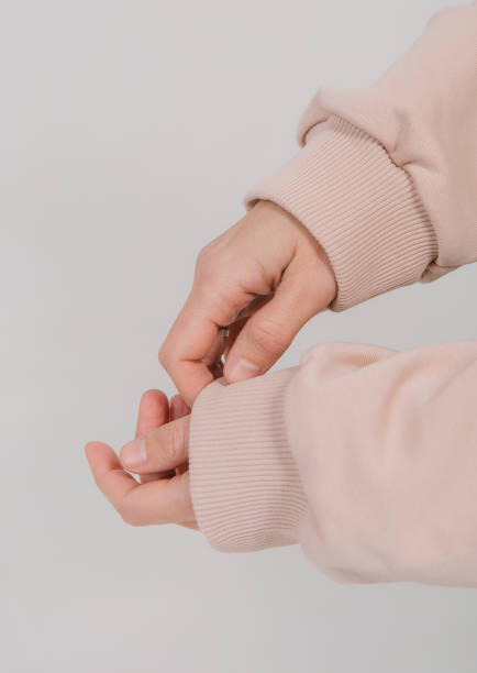 istock sweatshirt long sleeves female hands elastic bands 1289758704