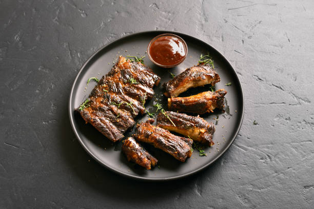 istock Spicy hot grilled spare ribs on plate 1289759700