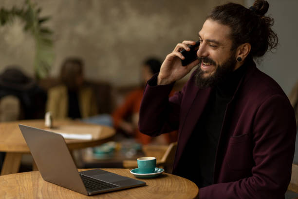 istock Young Caucasian male freelancer working on his laptop 1289759793
