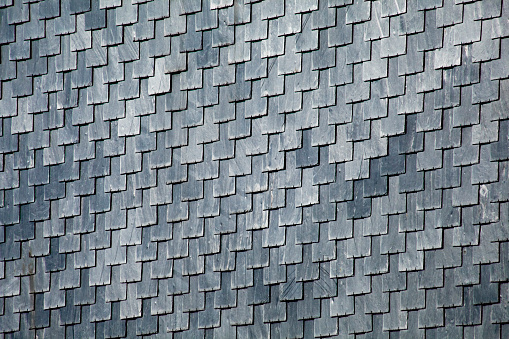 Close up of slate rooftop pattern, full frame high angle view. Image suitable for background purposes. Galicia, Spain.