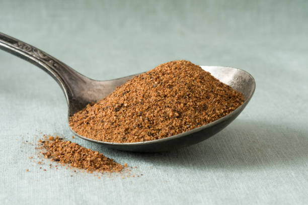istock Ground Nutmeg Spilled from a Vintage Spoon 1289763946