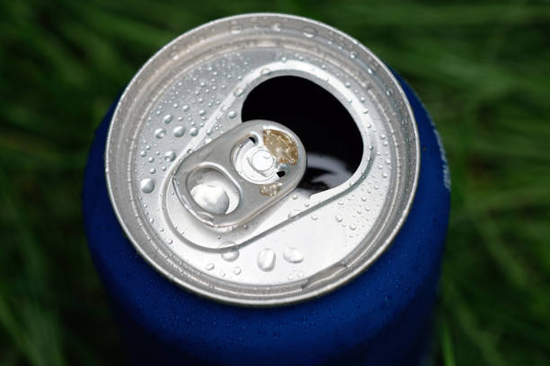 istock open metal tin can with a drink top view. 1289765669