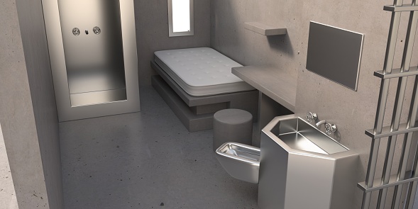 Prison cell interior. Maximum security ADX supermax penitentiary cage, concrete wall and stainless steel accessories. 3d illustration
