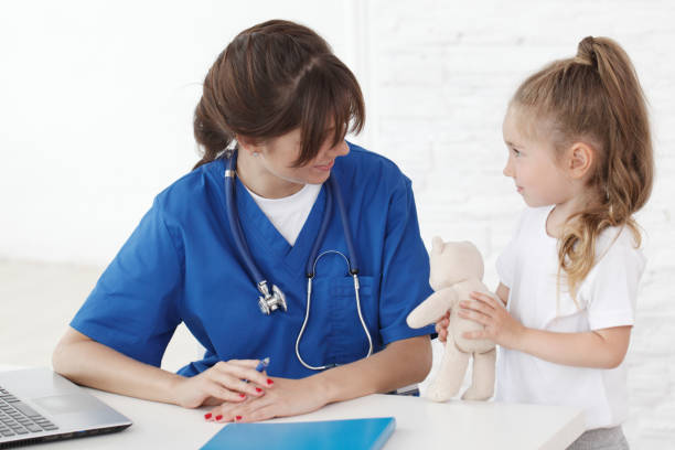 istock Doctor and her little patient 1289775298