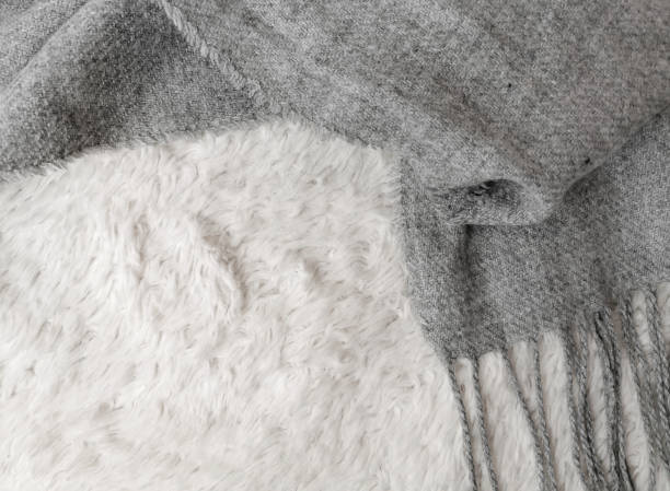 istock Woolen scarf of grey color 1289779155