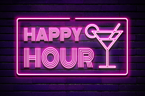 Happy hour cocktail glowing purple violet neon text on brick wall