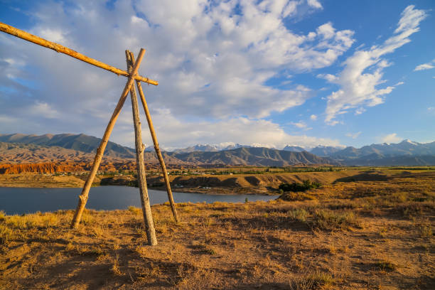 istock Issyk kul lake with mountains 1289781444