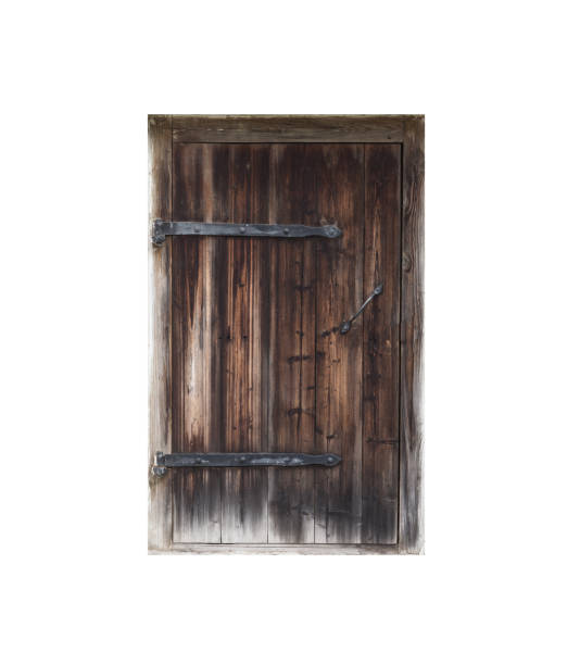 istock Old brown wooden door isolated on white 1289782496