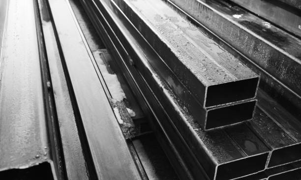 istock Stack of rolled metal products, black and white 1289782509
