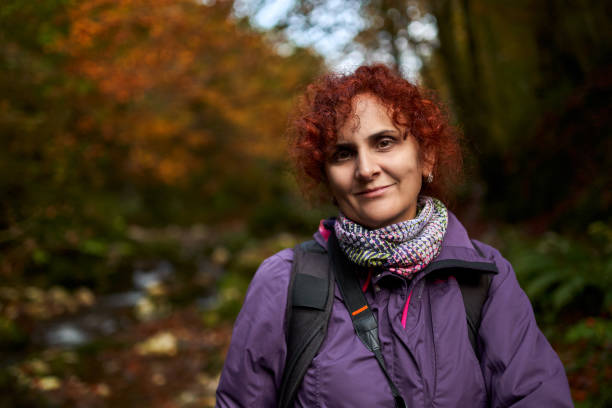 istock Happy woman enjoying her vacation 1289783566