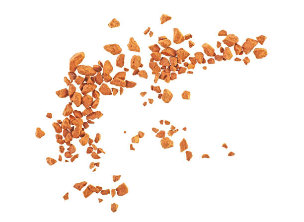 istock Instant coffee grains isolated on a white background, top view. Granulated coffee. 1289784422