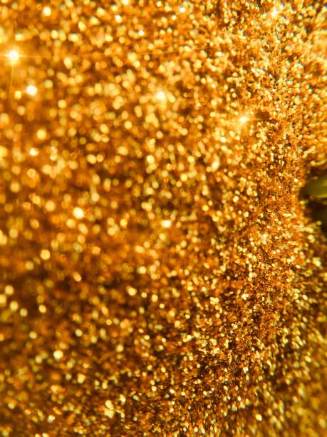 istock Golden texture and bokeh abstract background 1289785732