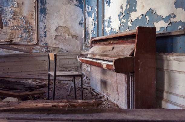 istock Forgotten piano in abandoned palace 1289788860