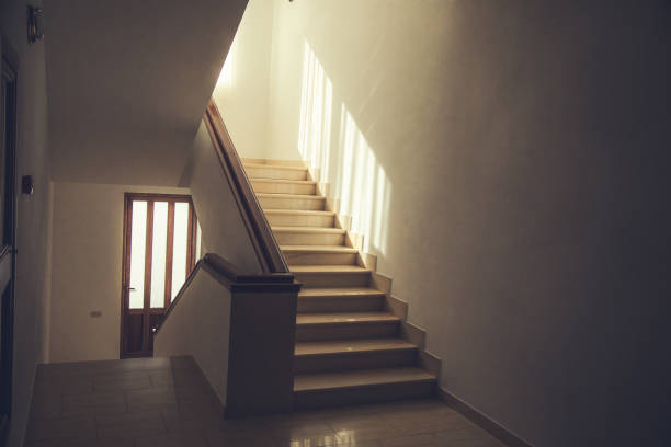 Stairs inside of public building with nobody