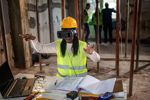 Construction site worker using VR glasses